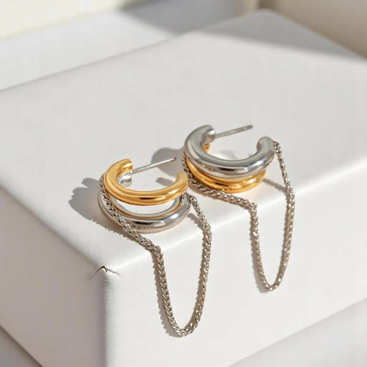 “aka” two toned earrings