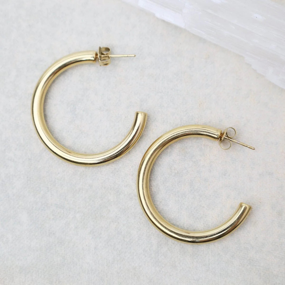 “huda” hoop earrings