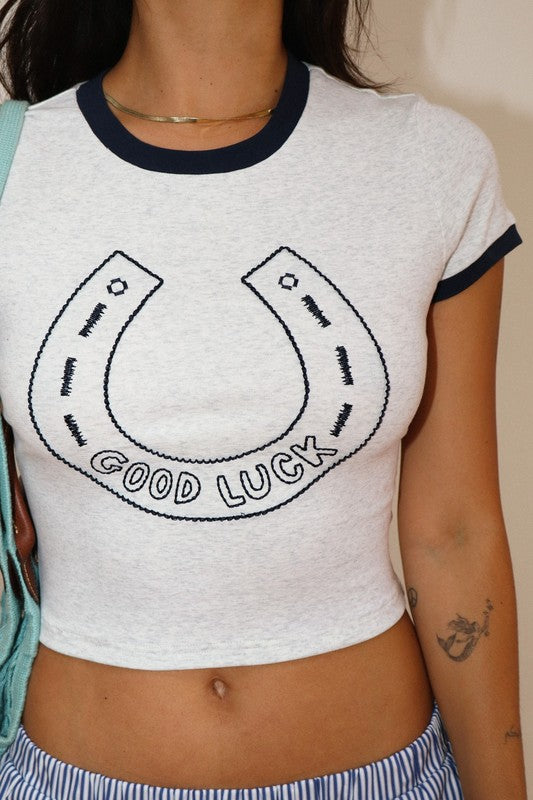“buena suerte” baby tee
