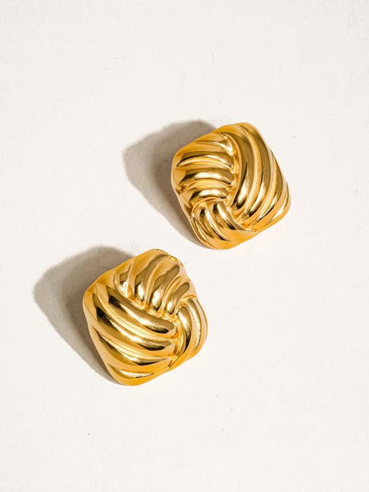 Accesorios 
 “Thel”  wavy square studs