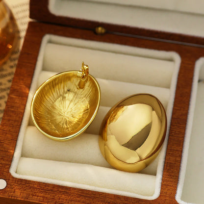 “isabel” gold oval studs